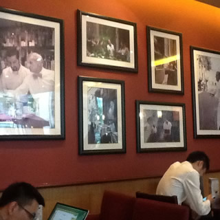 Costa Coffee -- toasted sandwiches, long blacks and muffins, complete with European street scenes on the walls