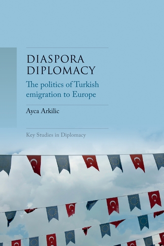 This book cover is a photo of several banners with small Turkish and European Union flags on the backdrop of a blue sky.