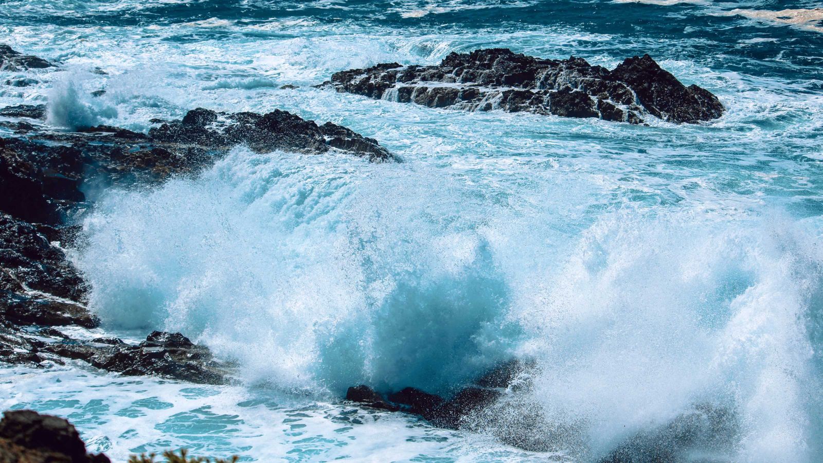 Waves washing over rocky shore