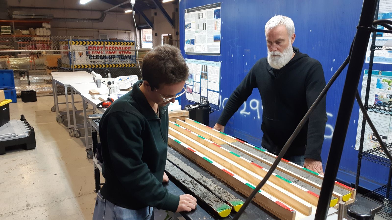 Linda Balfoort and Richard Levy examine a split sediment core