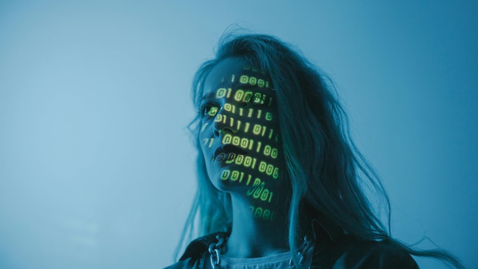 Woman with computer code on her face 