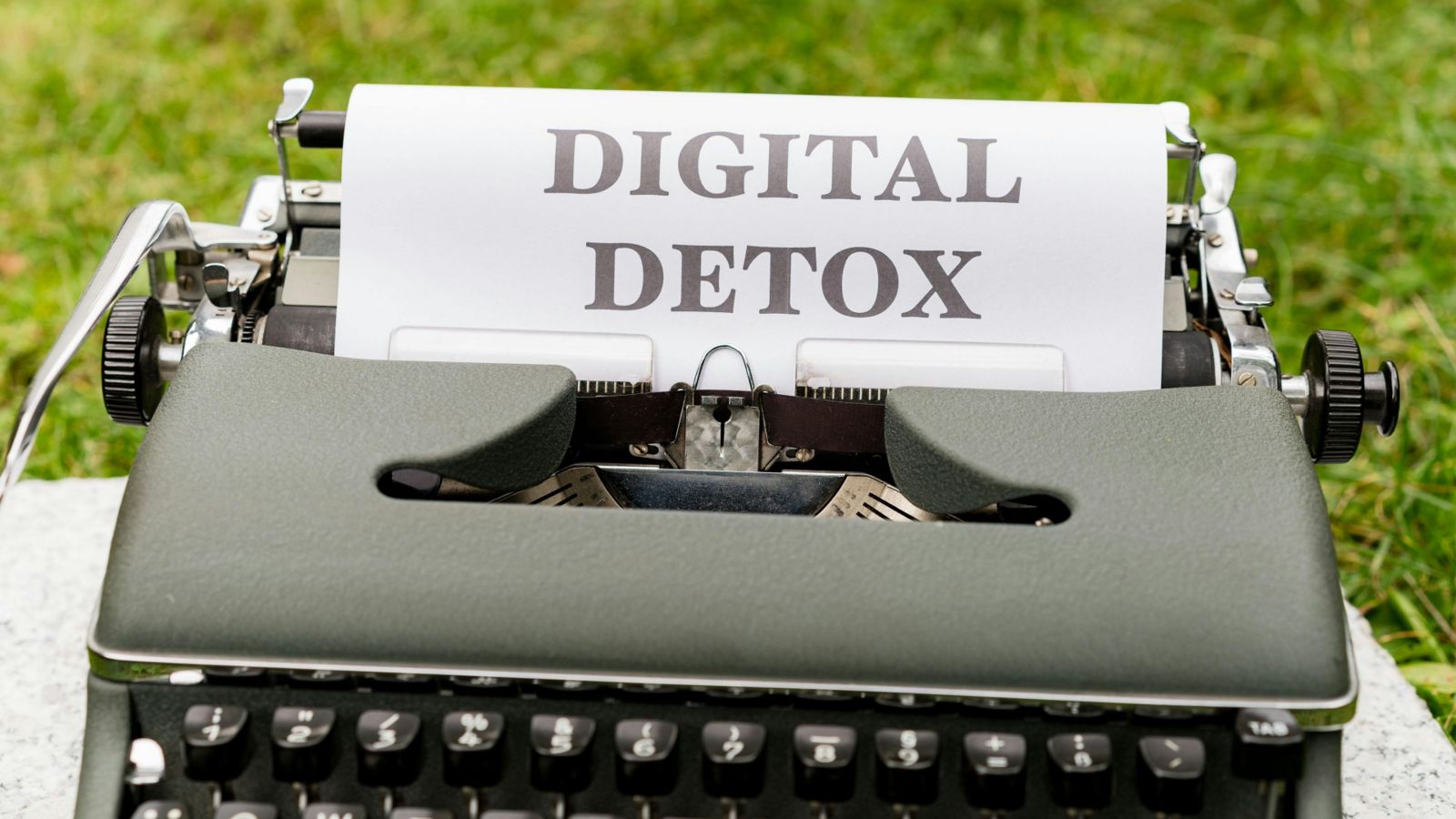 A typewriter with the words 'digital detox' 