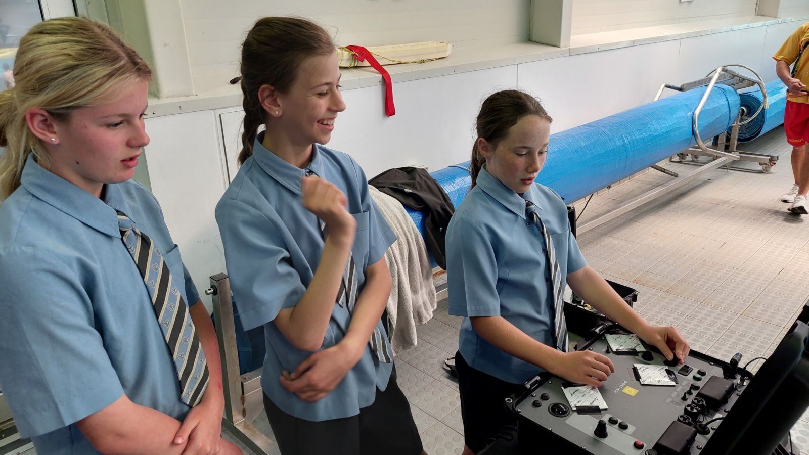 A group of students driving the University's underwater remotely operated vehicle